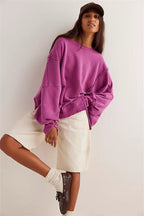 Women's oversized sweatshirt with crew neckline, balloon sleeves and side slits