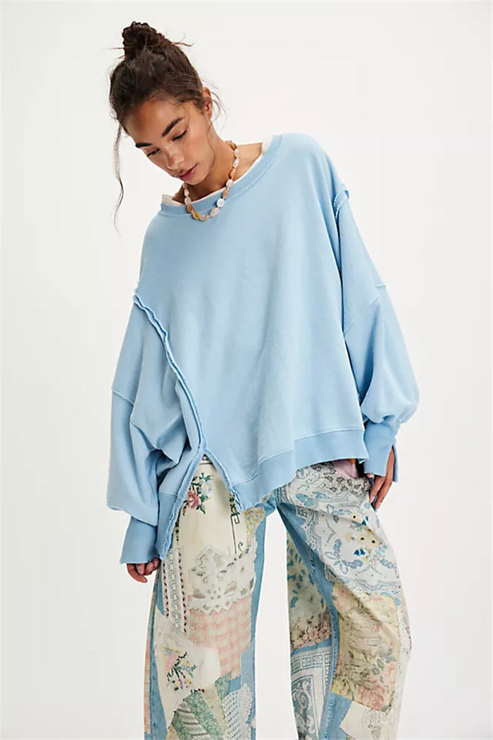 Women's oversized sweatshirt with crew neckline, balloon sleeves and side slits