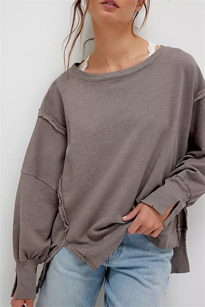 Women's oversized sweatshirt with crew neckline, balloon sleeves and side slits
