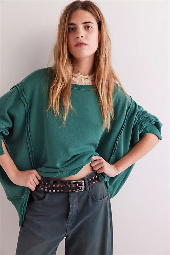 Women's oversized sweatshirt with crew neckline, balloon sleeves and side slits