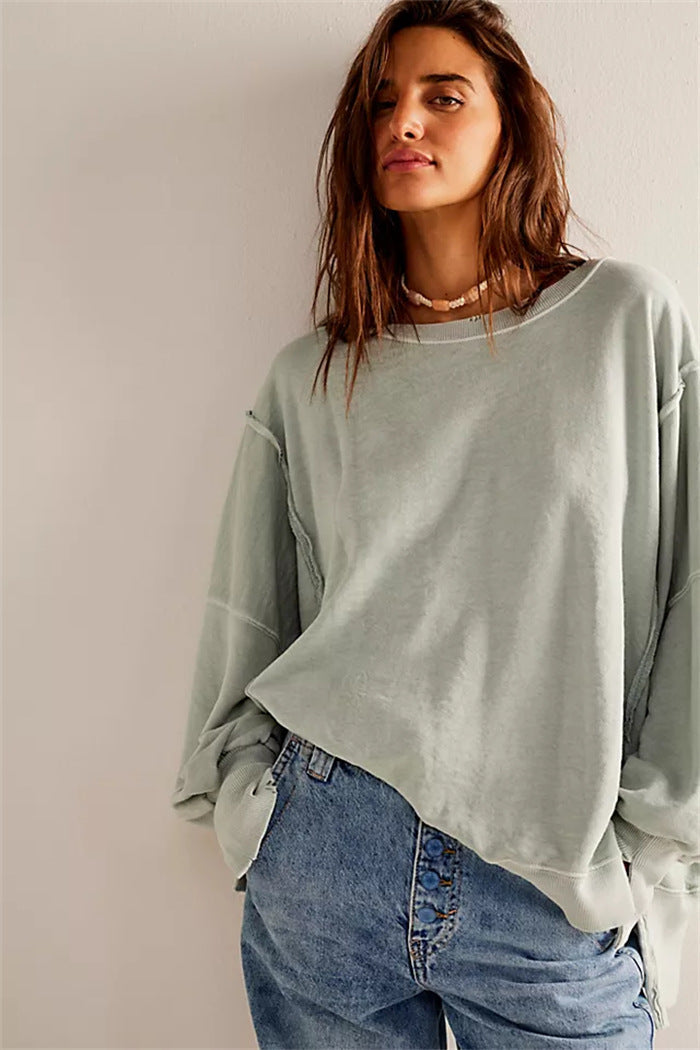 Women's oversized sweatshirt with crew neckline, balloon sleeves and side slits