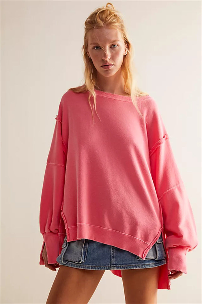 Women's oversized sweatshirt with crew neckline, balloon sleeves and side slits
