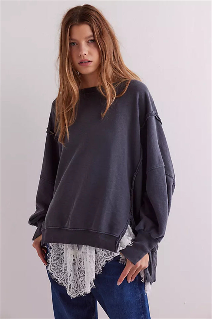 Women's oversized sweatshirt with crew neckline, balloon sleeves and side slits