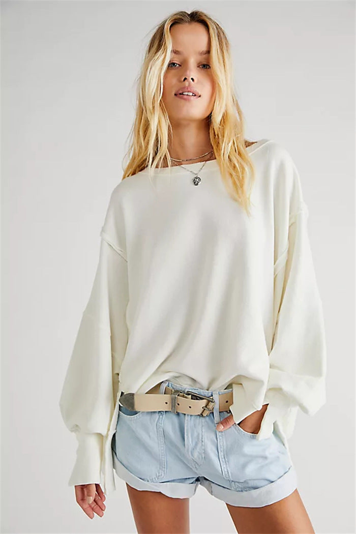 Women's oversized sweatshirt with crew neckline, balloon sleeves and side slits