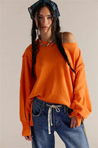 Women's oversized sweatshirt with crew neckline, balloon sleeves and side slits