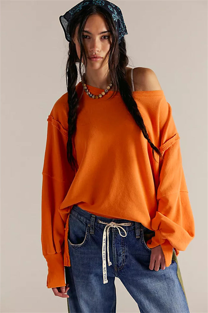 Women's oversized sweatshirt with crew neckline, balloon sleeves and side slits