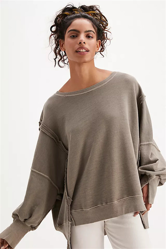 Women's oversized sweatshirt with crew neckline, balloon sleeves and side slits