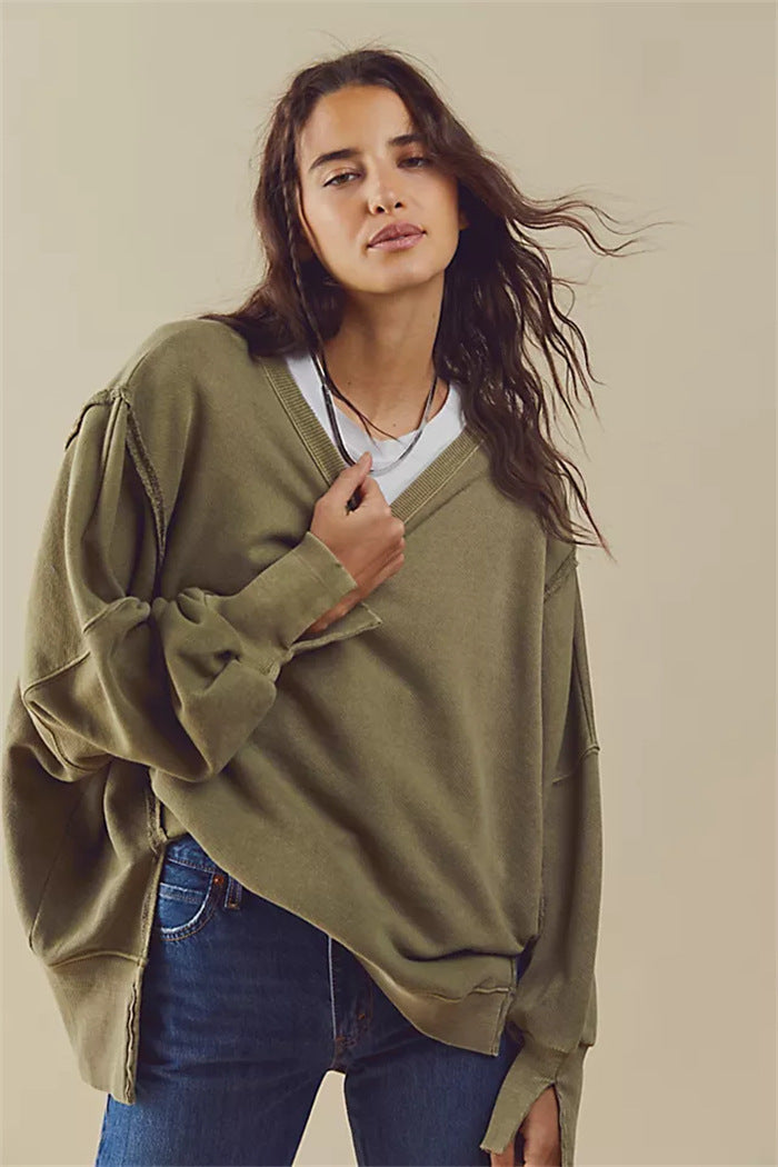 Women's oversized sweatshirt with crew neckline, balloon sleeves and side slits