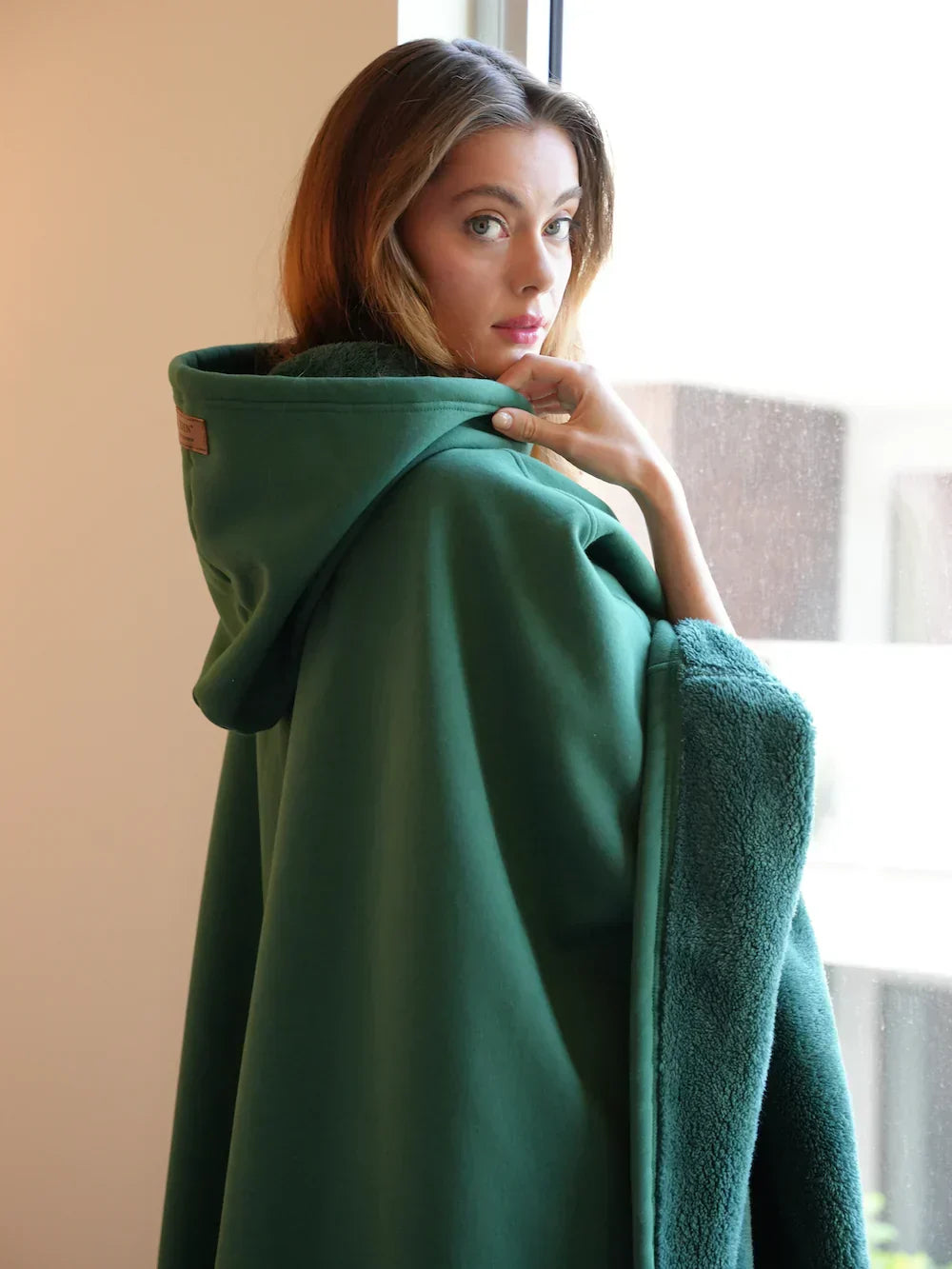 Women's oversized hooded poncho sweatshirt with diagonal front panel