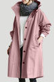 Women's oversized hooded rain parka coat with button front and elastic cuffs