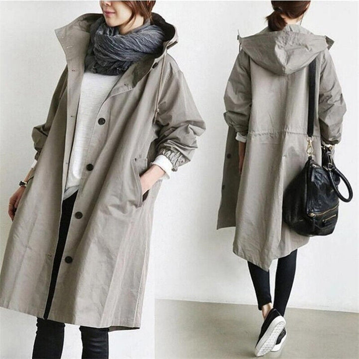 Women's oversized hooded rain parka coat with button front and elastic cuffs