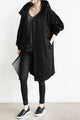 Women's oversized hooded rain parka coat with button front and elastic cuffs