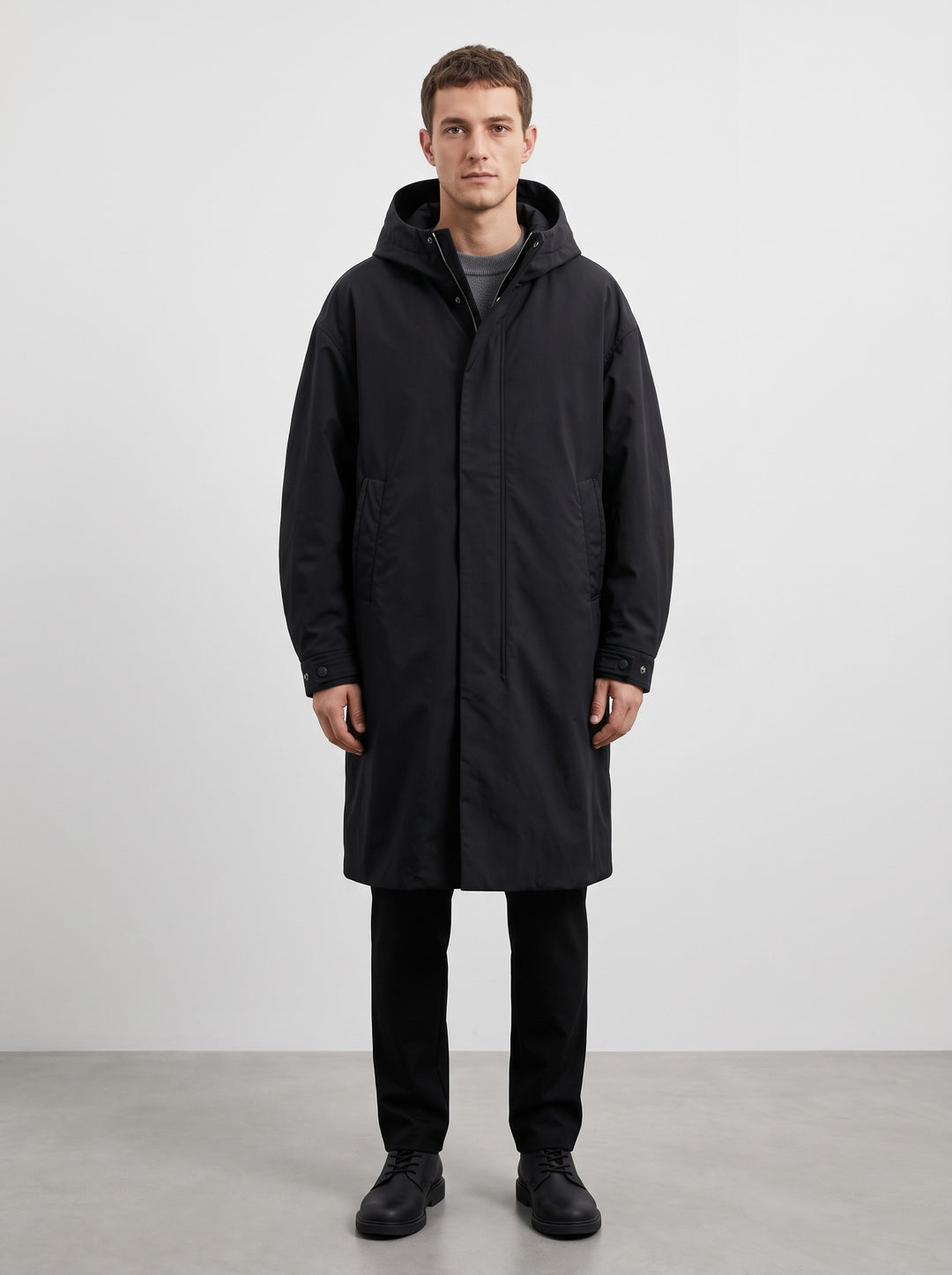 Men's longline hooded waterproof raincoat in black