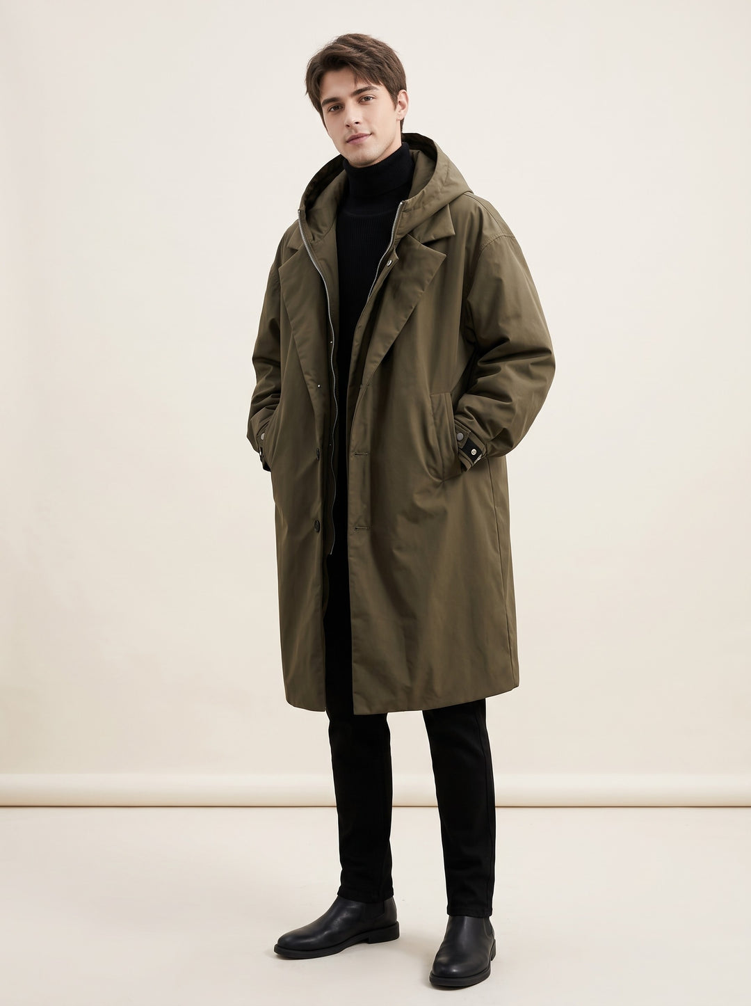 Men's longline hooded waterproof raincoat in green