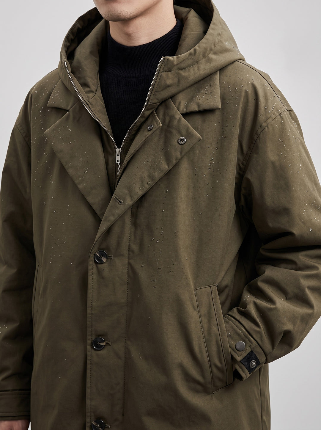Men's longline hooded waterproof raincoat in green