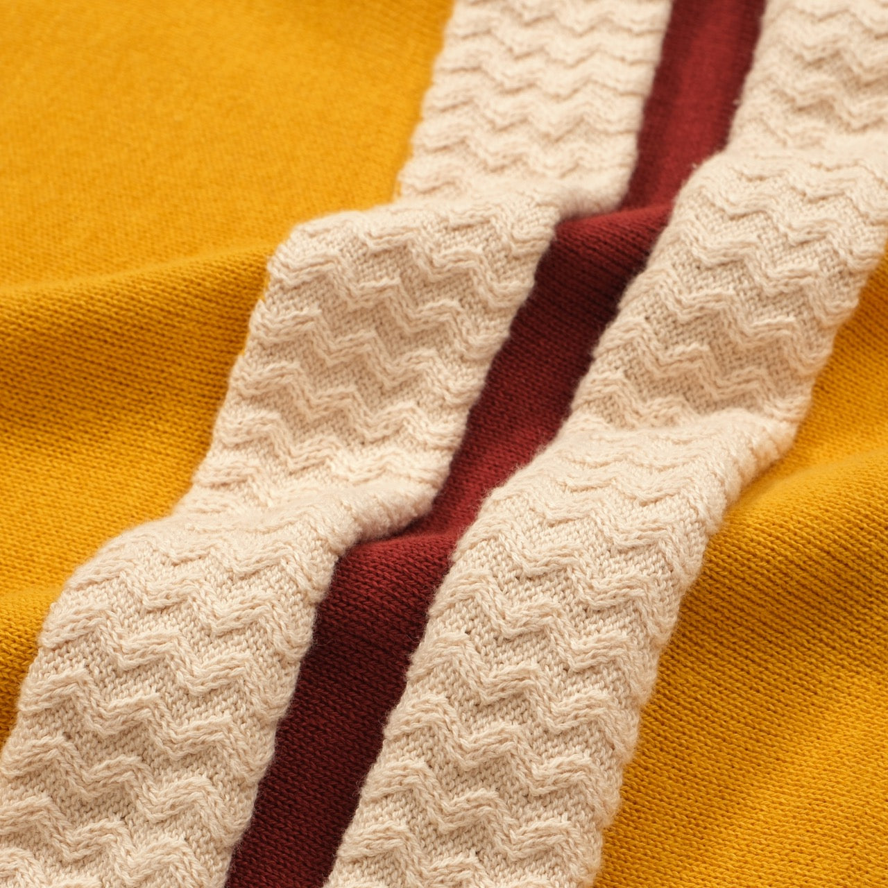 Men's yellow striped knit polo shirt with short sleeves