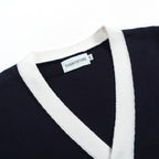 Men's navy cardigan with pale contrast trim and button front