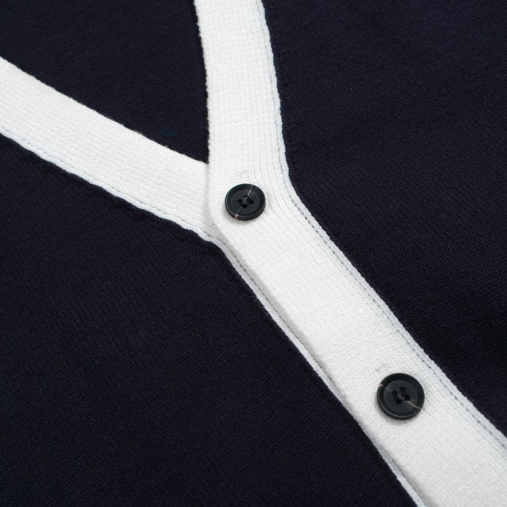 Men's navy cardigan with pale contrast trim and button front