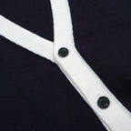 Men's navy cardigan with pale contrast trim and button front