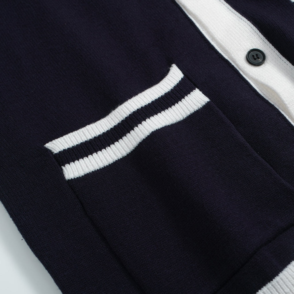 Men's navy cardigan with pale contrast trim and button front