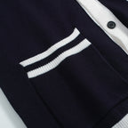 Men's navy cardigan with pale contrast trim and button front