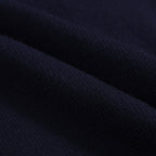 Men's navy cardigan with pale contrast trim and button front