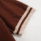 Men's brown knit polo with vertical retro stripes and short sleeves