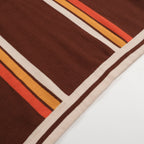 Men's brown knit polo with vertical retro stripes and short sleeves
