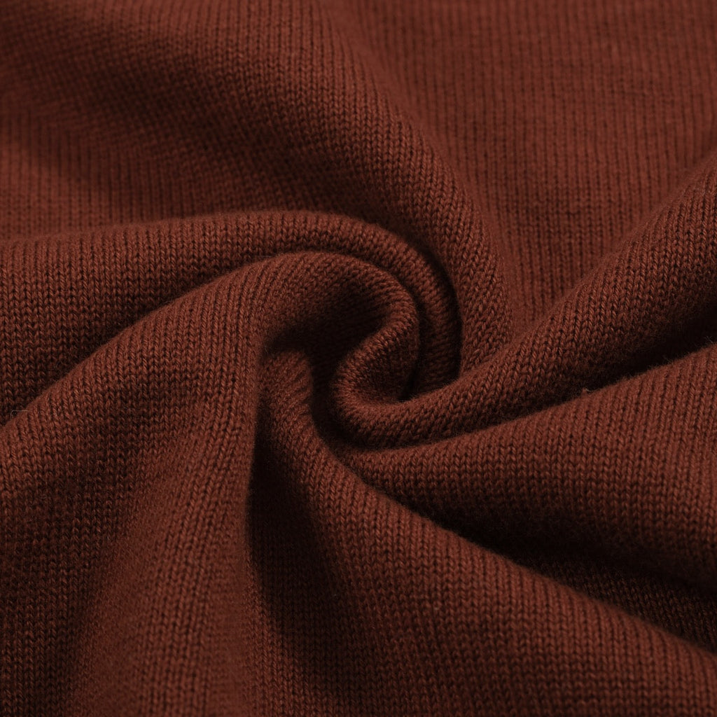 Men's brown knit polo with vertical retro stripes and short sleeves