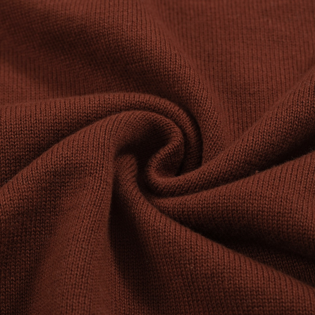 Men's brown knit polo with vertical retro stripes and short sleeves