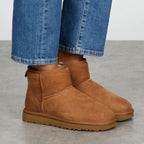 Women's mini ankle boots with round toes and textured soles
