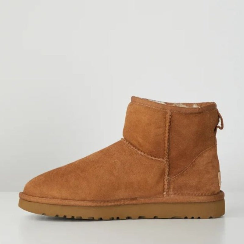 Women's mini ankle boots with round toes and textured soles