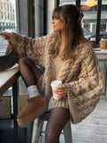 Women's textured cable knit jumper with wide sleeves and cocoon fit