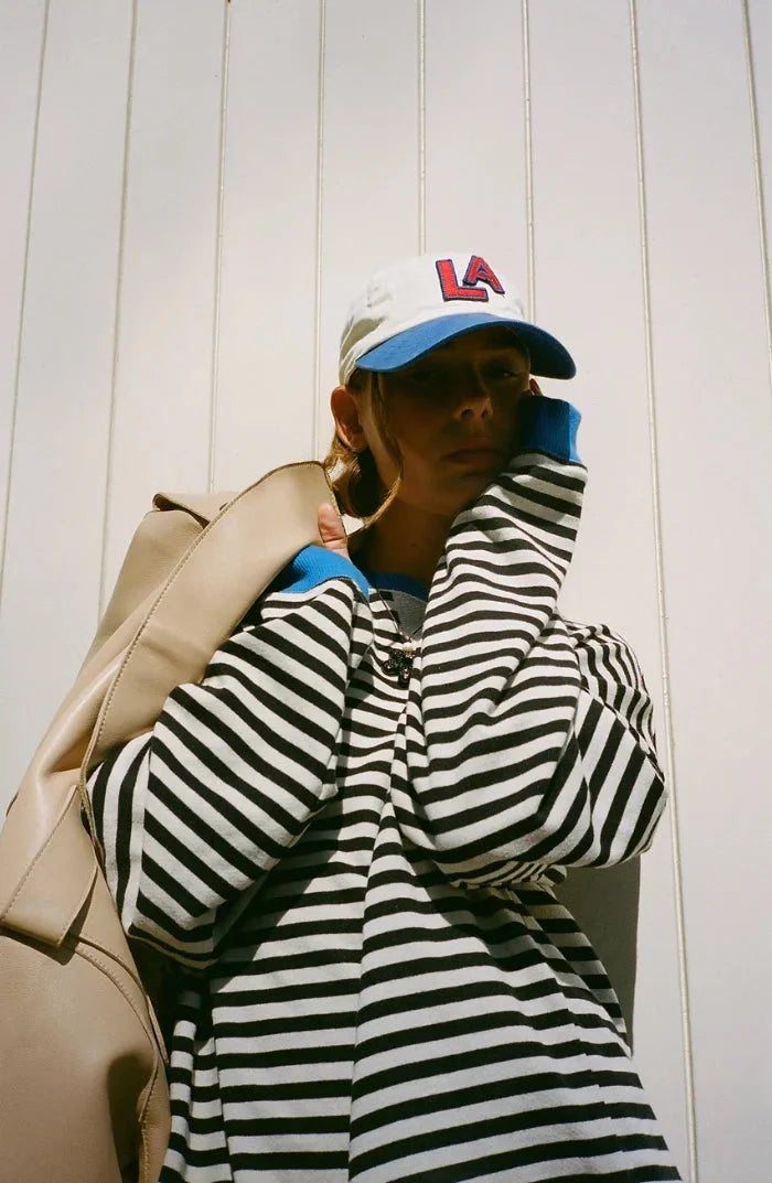 Women's loose striped sweater with crew neckline and long sleeves