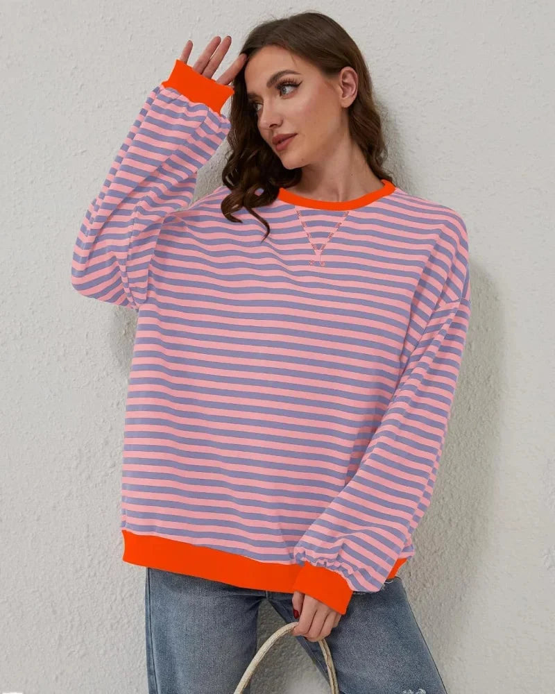 Women's oversized striped sweater with long sleeves and ribbed trims