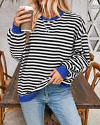 Women's oversized striped sweater with long sleeves and ribbed trims