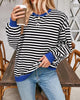Women's oversized striped sweater with long sleeves and ribbed trims