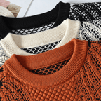 Unisex knitted sweater with repeated pumpkin motifs, crew neck and long sleeves