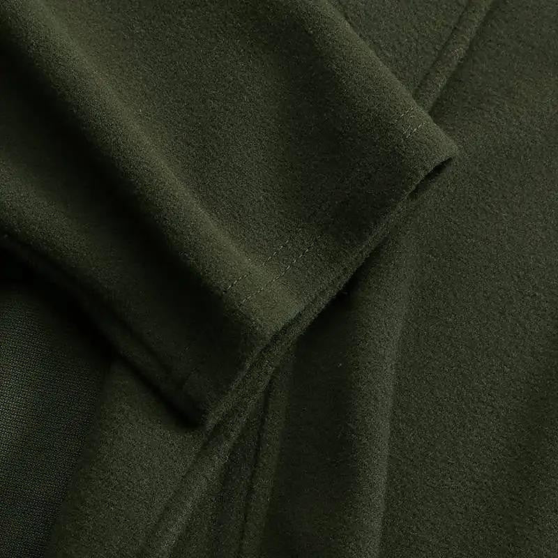 Women's long lapel trench coat shown in black and green