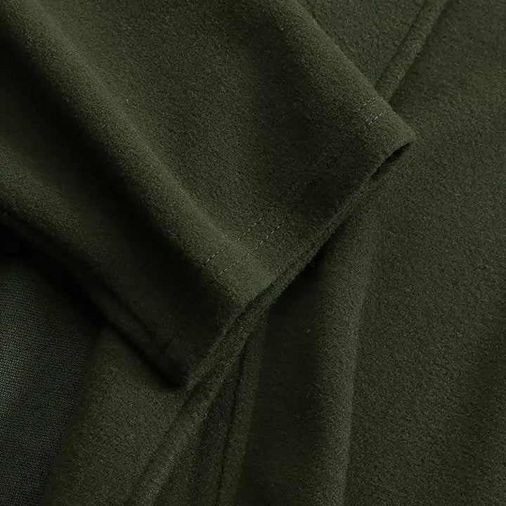 Women's long lapel trench coat shown in black and green