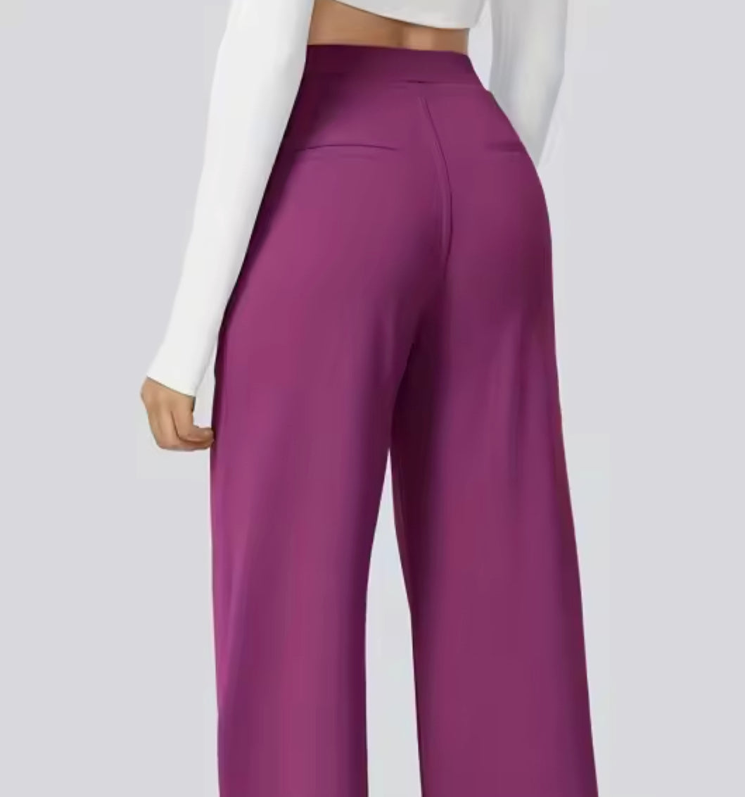 Women's high-waisted wide-leg trousers shown in multiple colours
