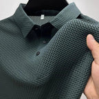 Men's textured polo shirt with collared neckline and button placket