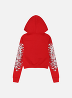 Women's red cropped hoodie with white and grey graphic print, hood and zip front