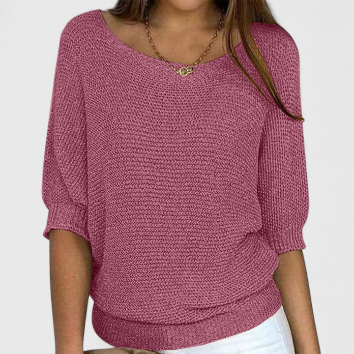 Women's textured knit pullover with round neckline and three-quarter sleeves