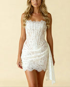 Women's strapless lace corset mini dress with asymmetric draped hem