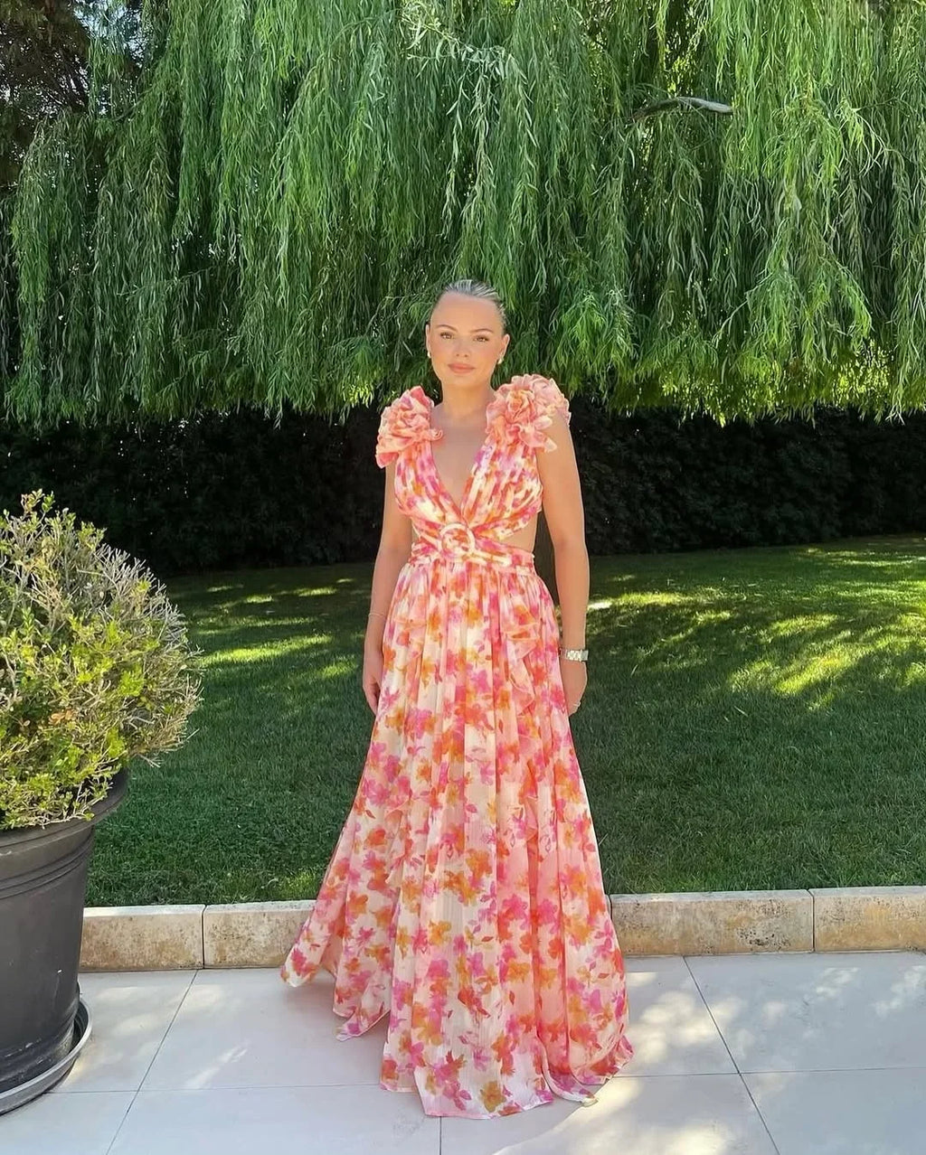 Women's pink floral maxi dress with ruffle straps