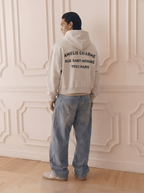 Grey graphic pullover hoodie with hood and back text print