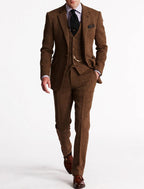 Men's tailored herringbone three-piece suit with jacket, waistcoat and trousers