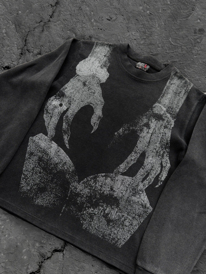 Dark graphic sweatshirt with contrasting front figure design