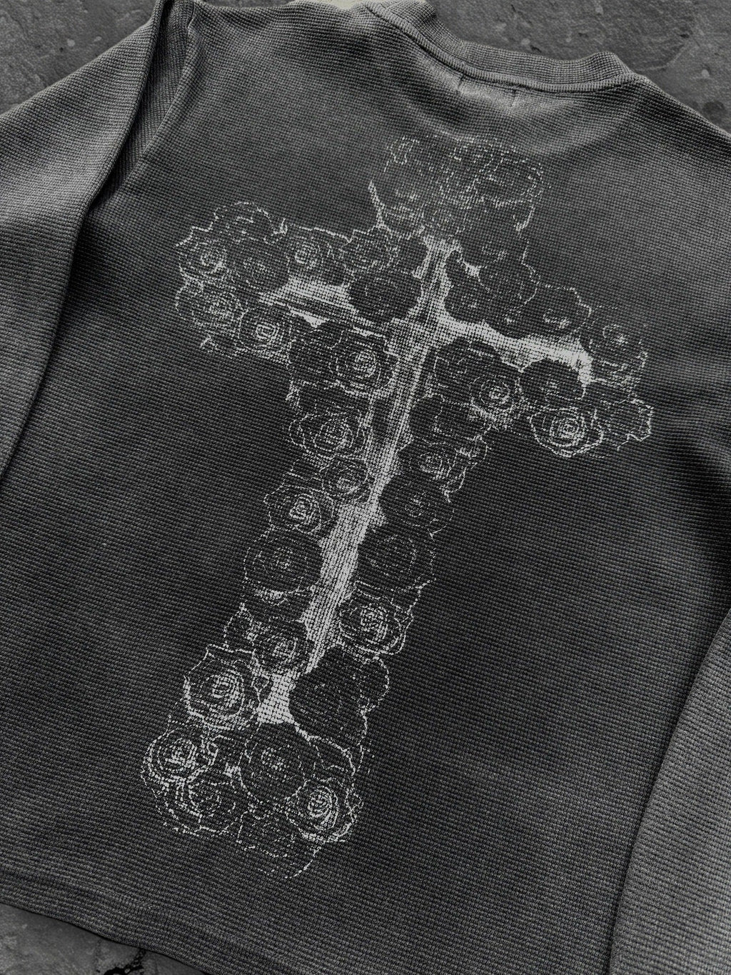 Dark graphic sweatshirt with contrasting front figure design